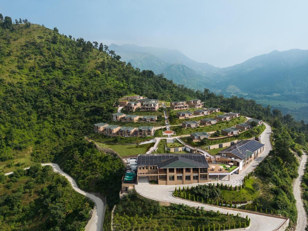 an aerial view of a resort on a mountain at Welcomhotel By ITC Hotels, Jim Corbett in Marchula