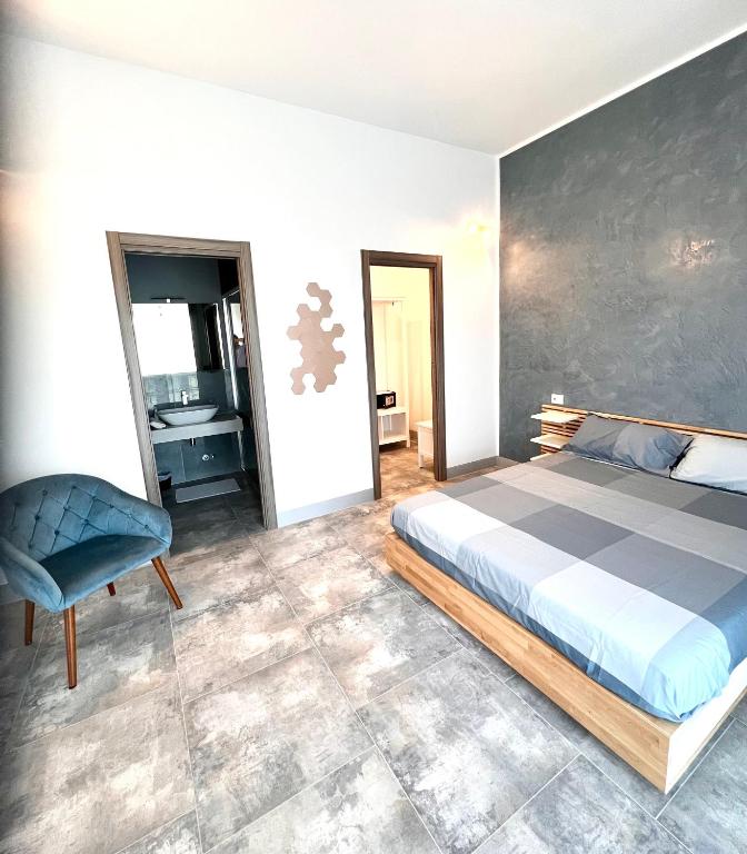 Posteľ alebo postele v izbe v ubytovaní Ubertini House