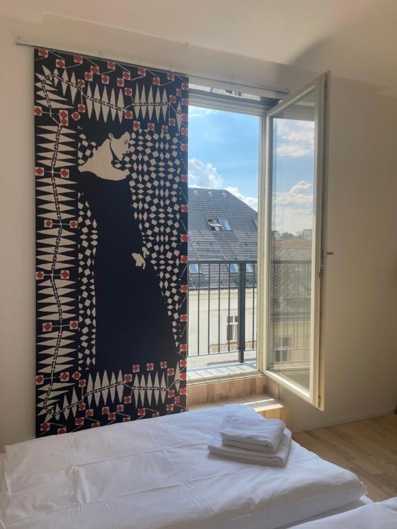 Postel nebo postele na pokoji v ubytování Hotel Praha Liberec