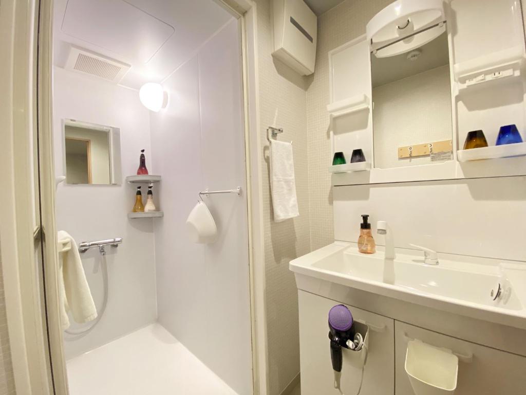 Koupelna v ubytování Takanobashi HOTEL