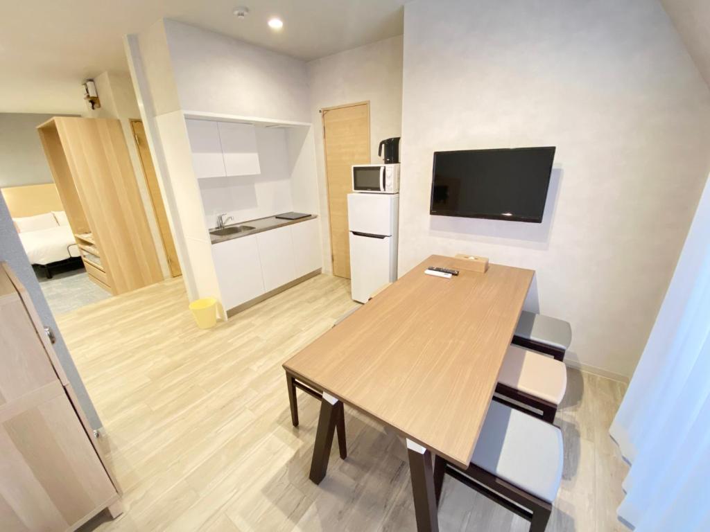 Kuchyň nebo kuchyňský kout v ubytování Takanobashi HOTEL