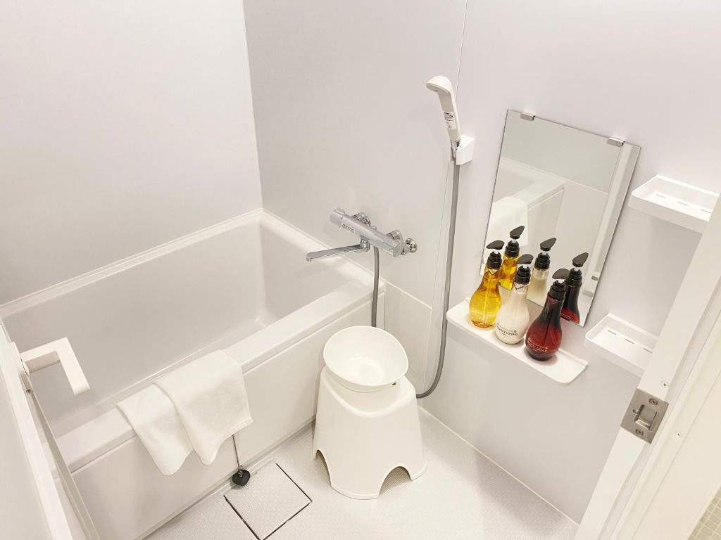 Koupelna v ubytování Takanobashi HOTEL