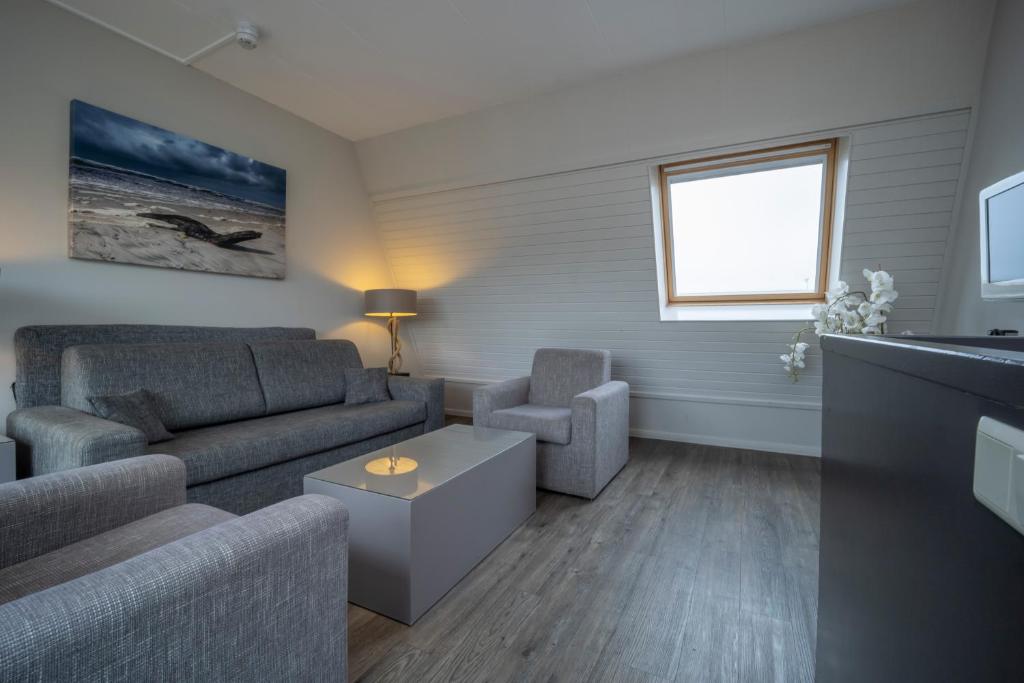 Posezení v ubytování Fletcher Zuiderduin Beachhotel