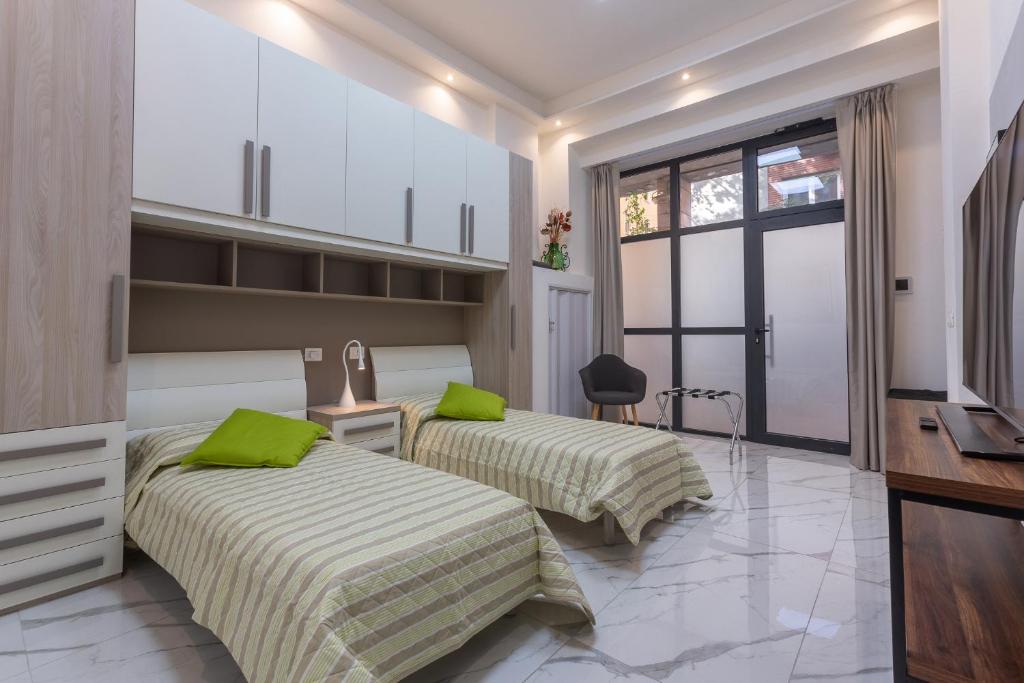 Posteľ alebo postele v izbe v ubytovaní Mini Loft San Carlo a 5 min da MAMbo Bologna