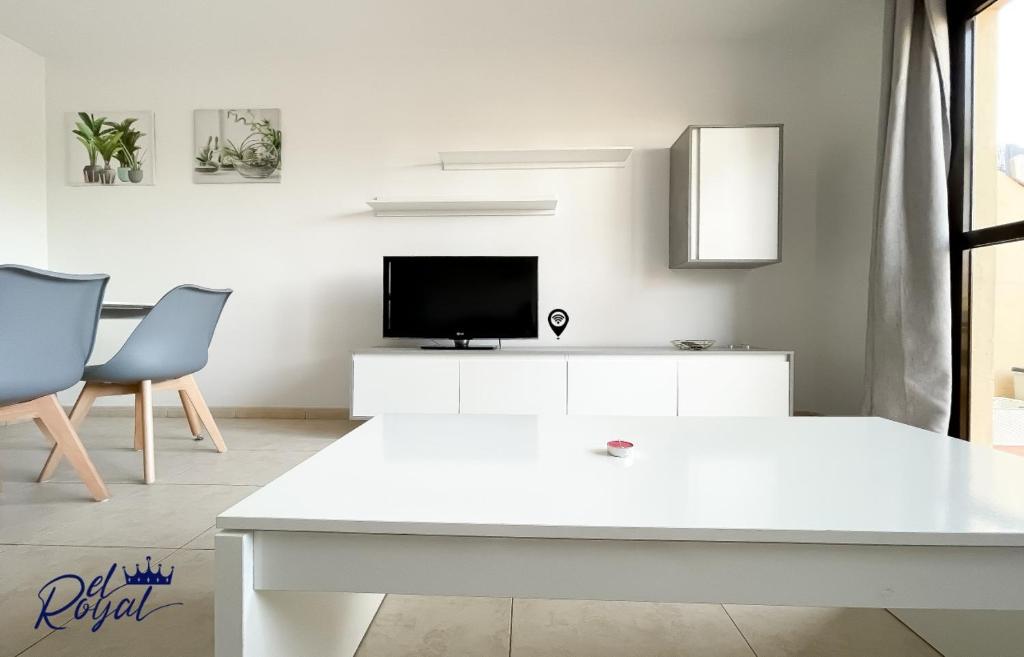 A television and/or entertainment centre at B-Rent El Royal Corralejo