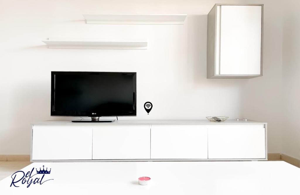 A television and/or entertainment centre at B-Rent El Royal Corralejo