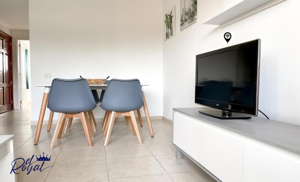 A television and/or entertainment centre at B-Rent El Royal Corralejo