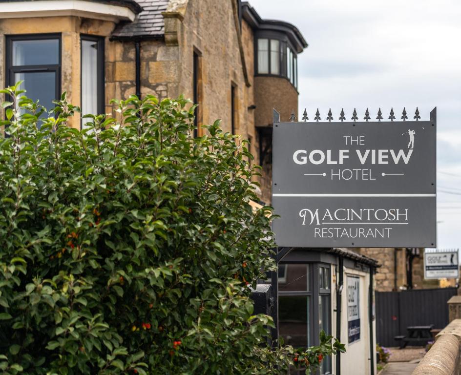 a sign for the golf view hotel in front of a building at GOLF View Hotel & Macintosh Restaurant in Lossiemouth