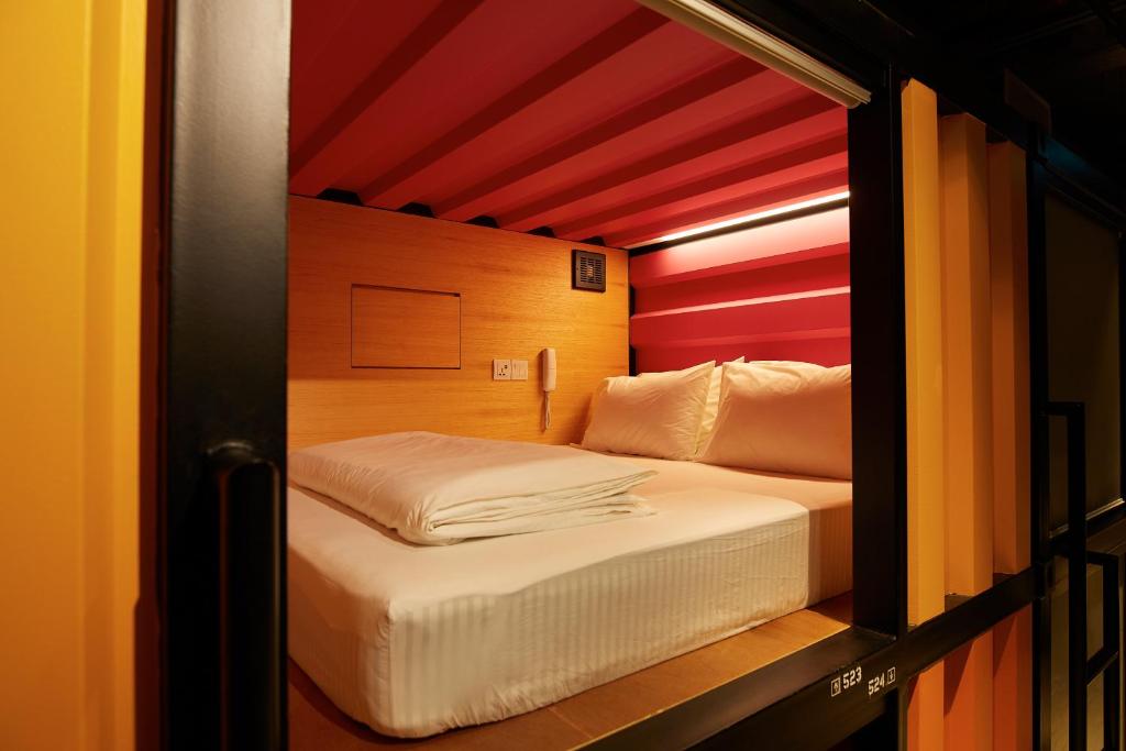 Letto o letti in una camera di CapsuleTransit Landside - Airport Hotel - Public Area - Gateway KLIA T2, Lvl 1