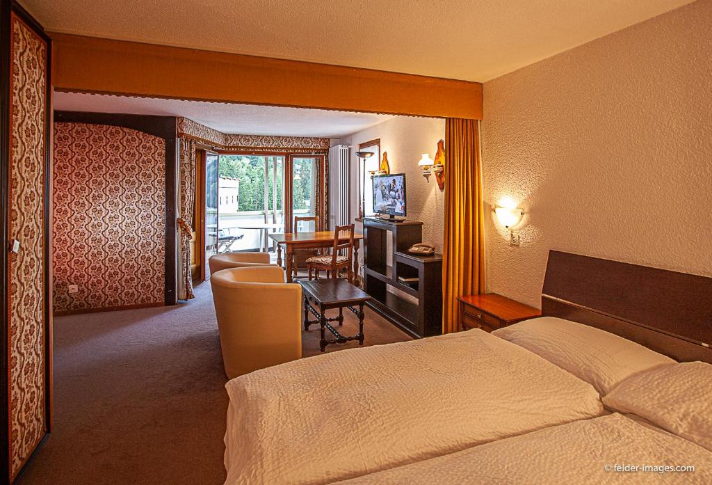 Postel nebo postele na pokoji v ubytování Hotel Astoria