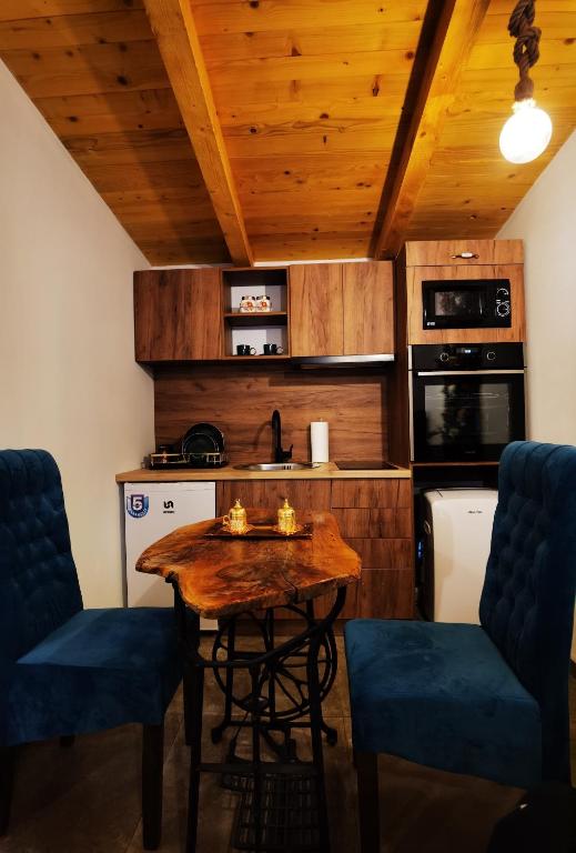 Kuchyň nebo kuchyňský kout v ubytování Odmaraliste Kod Miće Apartman 4
