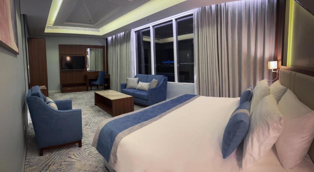 Postel nebo postele na pokoji v ubytování فندق ليفيل ناين Level Nine Hotel