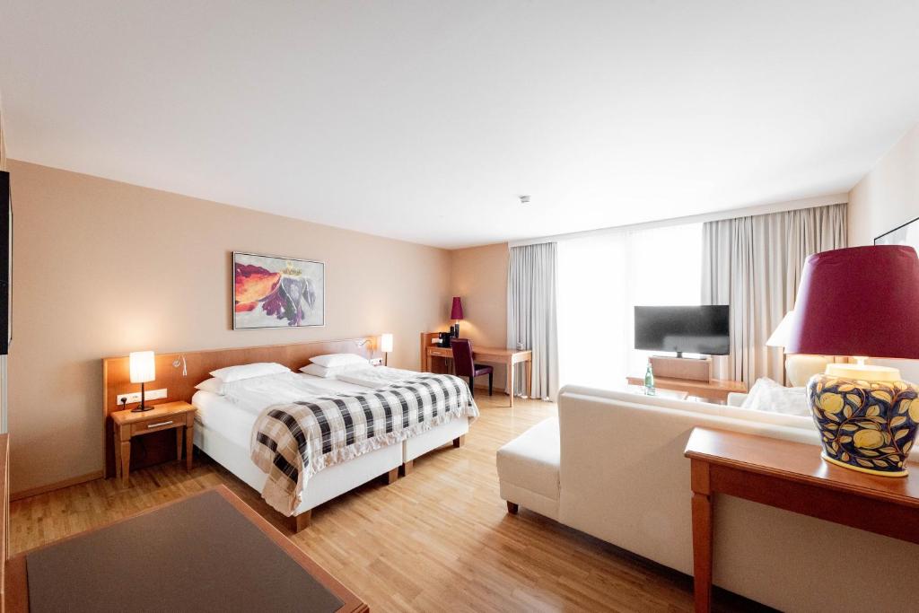 Postel nebo postele na pokoji v ubytování Avita Resort Bad Tatzmannsdorf