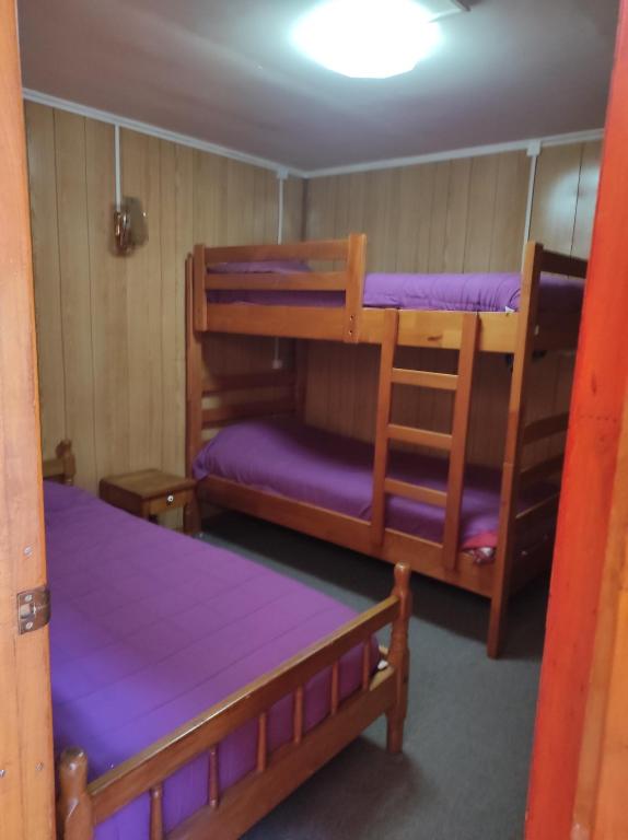 Voodi või voodid majutusasutuse La Minga Hostel toas