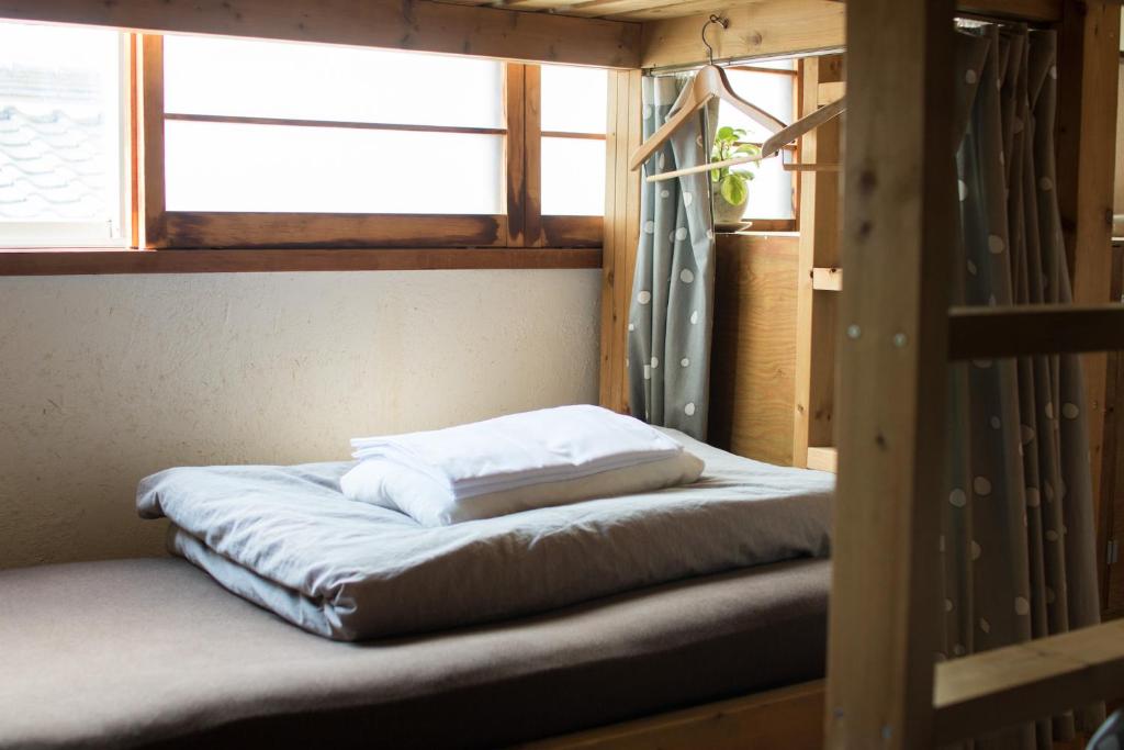 Postel nebo postele na pokoji v ubytování Ruco