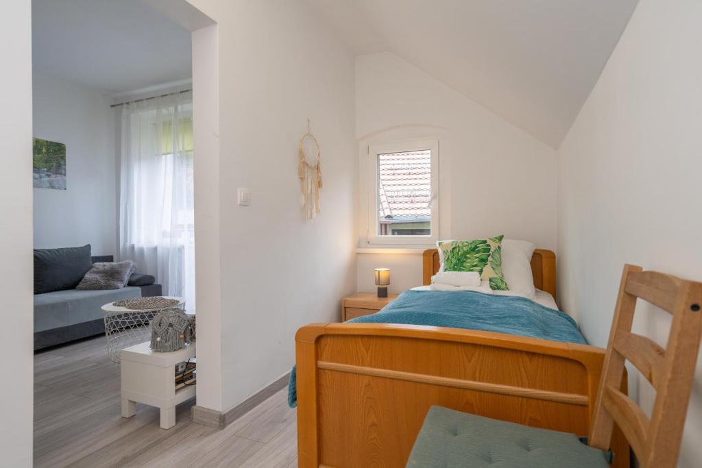 Posteľ alebo postele v izbe v ubytovaní Apartament Regina