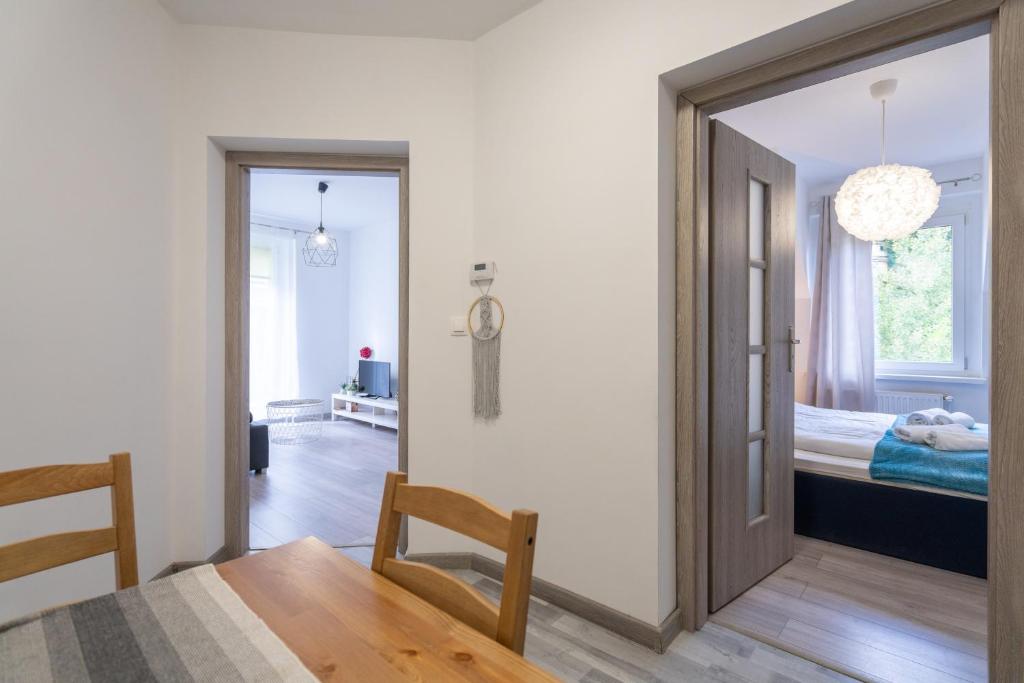 Posteľ alebo postele v izbe v ubytovaní Apartament Regina