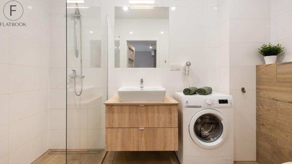Kúpeľňa v ubytovaní Flatbook - City Center SPA Apartments Motlawa