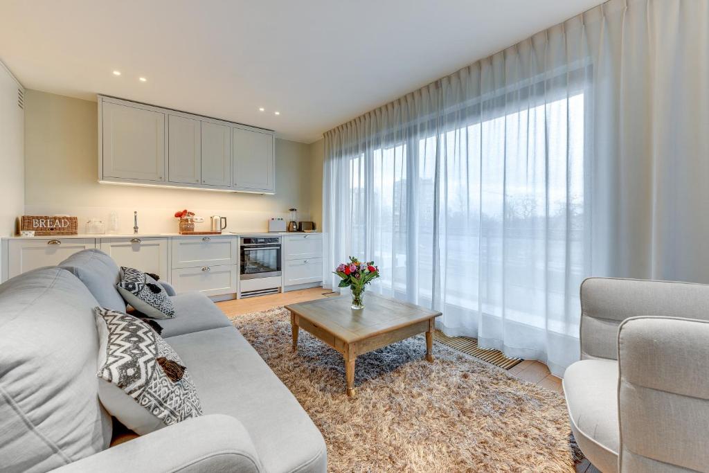Kuchyňa alebo kuchynka v ubytovaní Flatbook - City Center SPA Apartments Motlawa