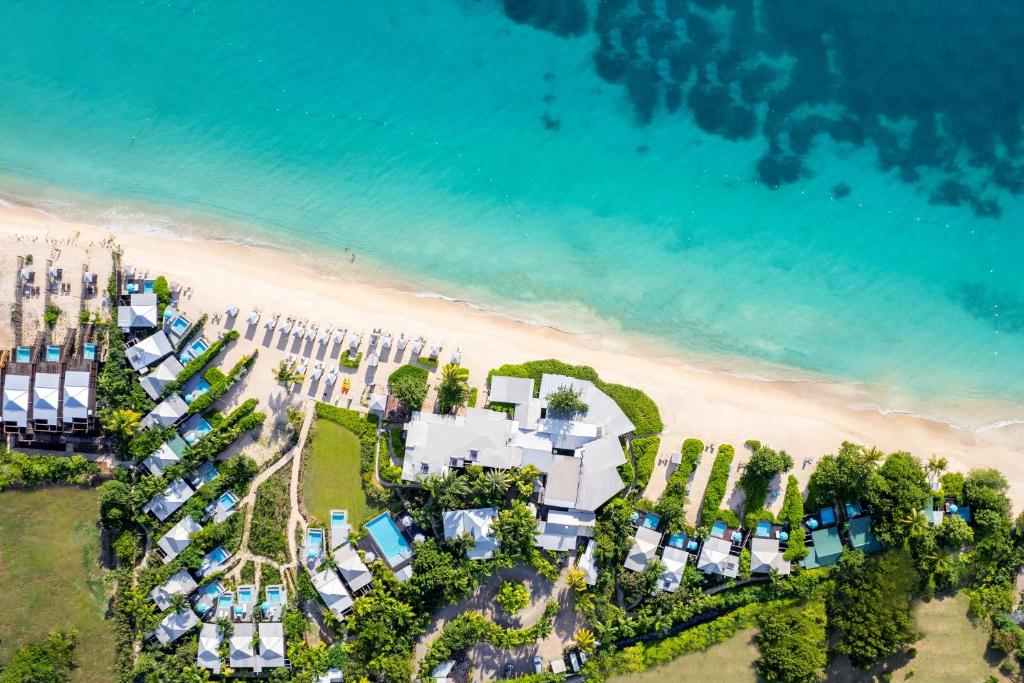 an aerial view of a resort on the beach at Keyonna Beach Resort Antigua - All Inclusive - Couples Only in Saint Johnʼs