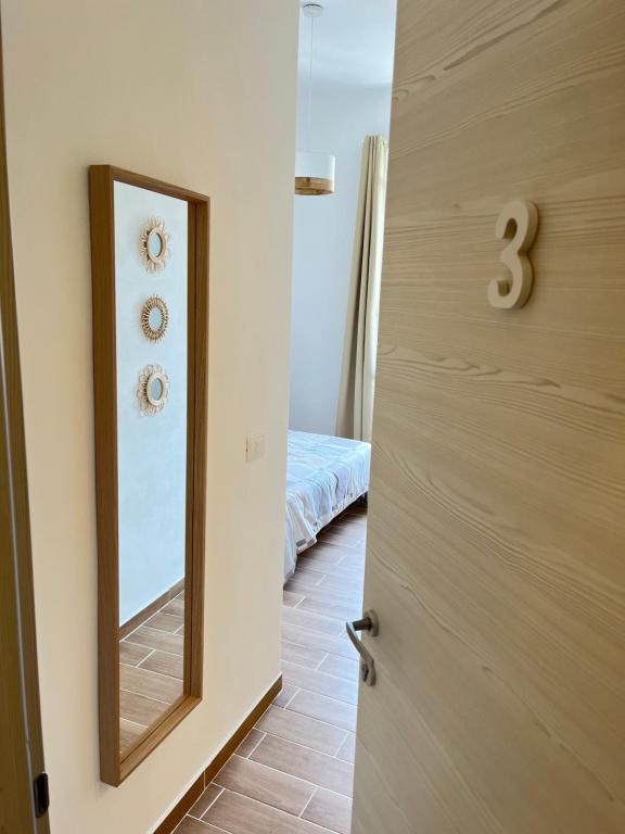 Postel nebo postele na pokoji v ubytování Le Tortorelle