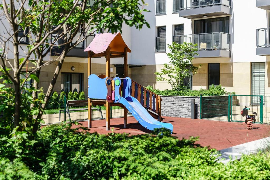 Detský kútik v ubytovaní Flatbook - City Center SPA Apartments Motlawa