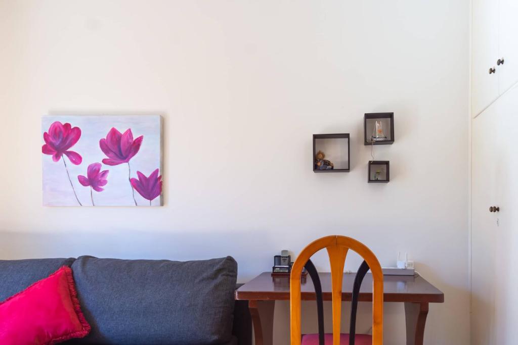 Posedenie v ubytovaní Mema's Tranquil Apartment in Patra