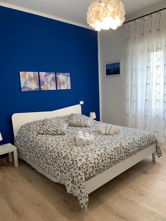 Postel nebo postele na pokoji v ubytování Casa Elodie