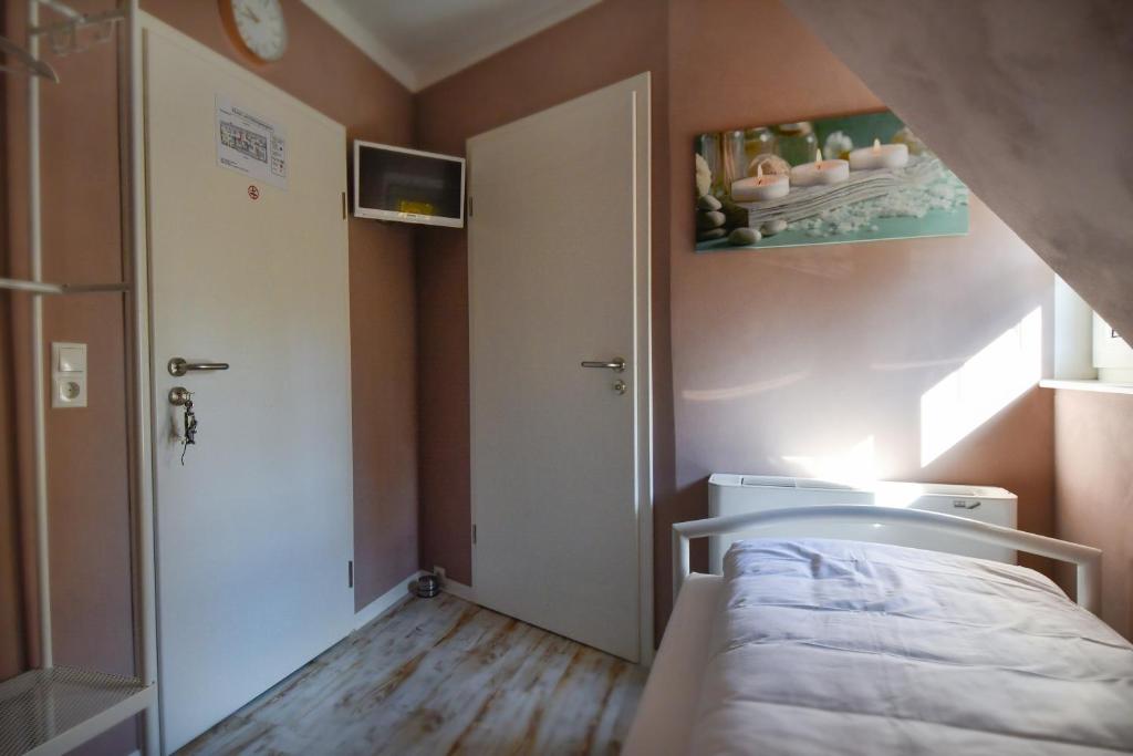 Postel nebo postele na pokoji v ubytování Historia Hotel