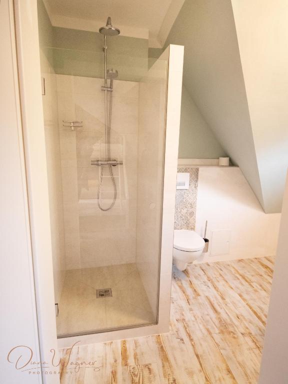 Koupelna v ubytování Historia Hotel