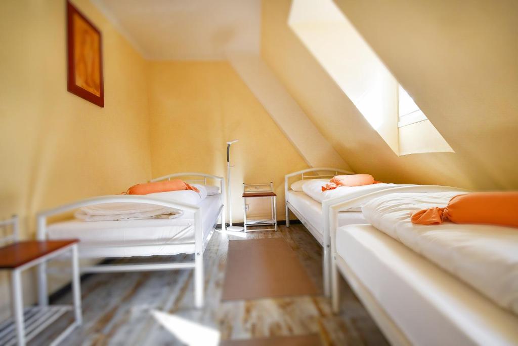 Postel nebo postele na pokoji v ubytování Historia Hotel