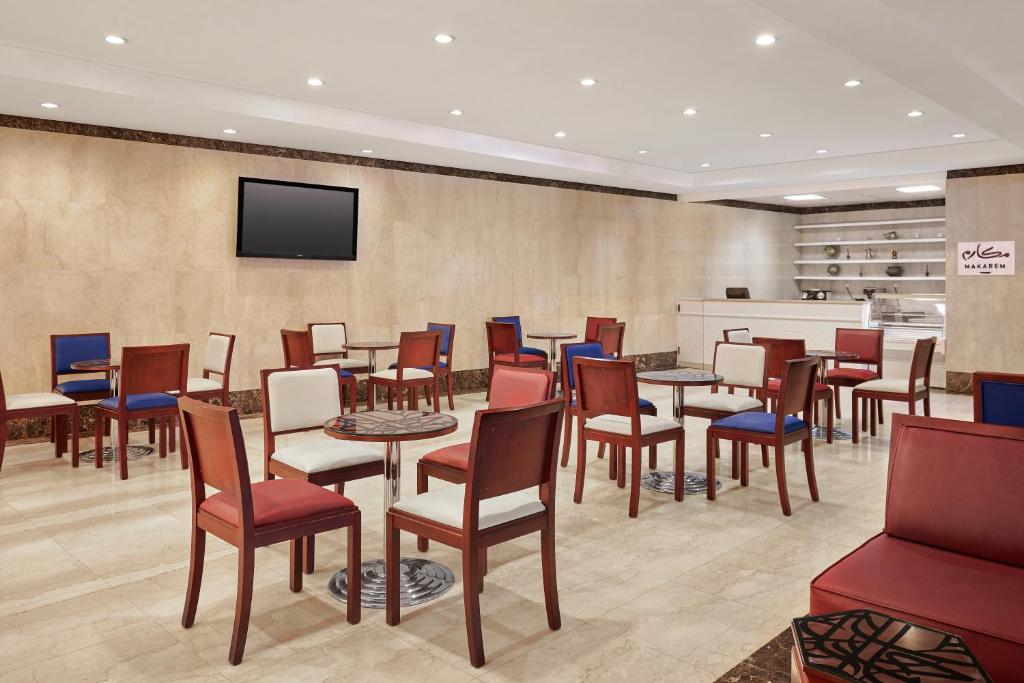 TV a/nebo společenská místnost v ubytování Makarem Al Bait Al Azizia Hotel