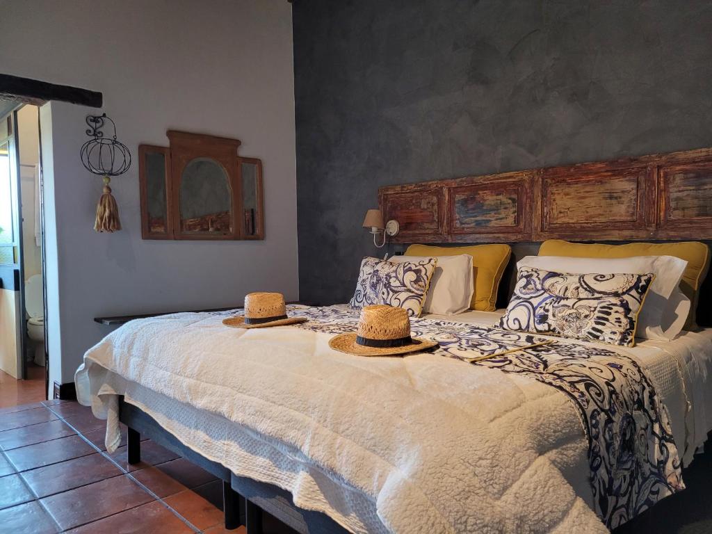 Postel nebo postele na pokoji v ubytování Finca La Saucina Casa de Campo