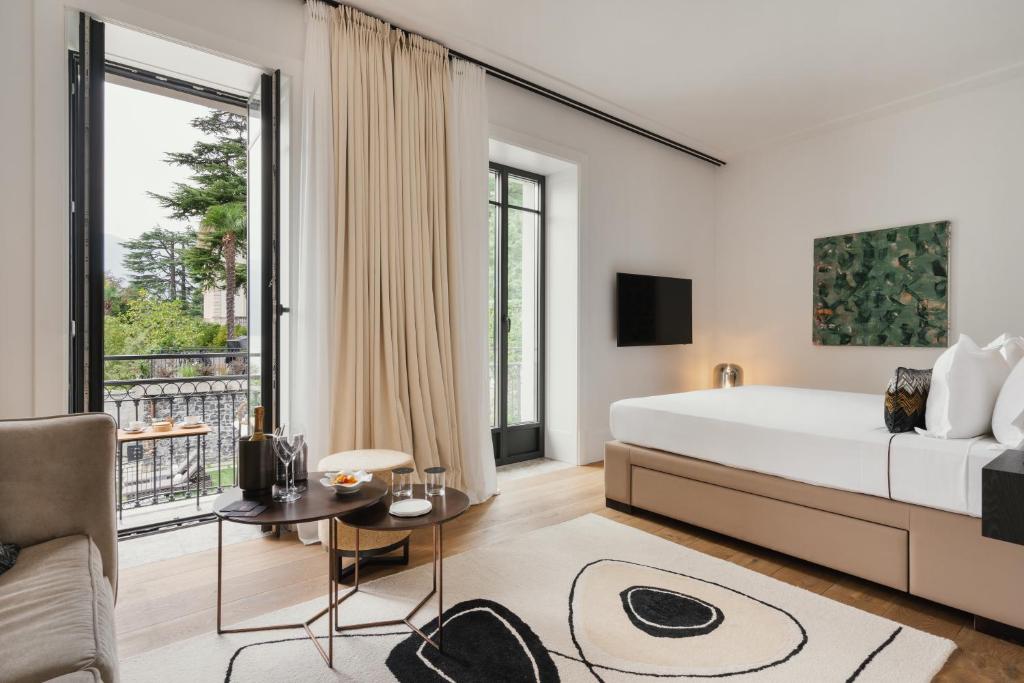 Postel nebo postele na pokoji v ubytování MUSA Lago di Como
