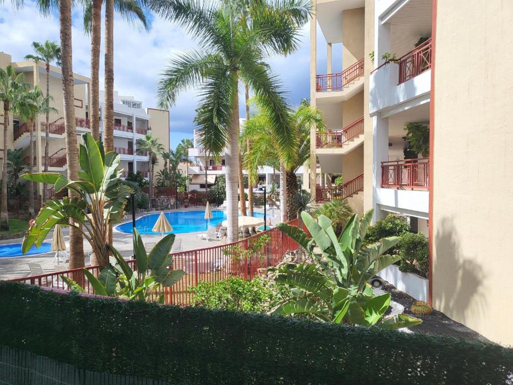 Πισίνα στο ή κοντά στο Oasis Palm Mar by HelloApartments