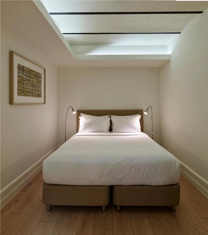 A bed or beds in a room at Be Mate Casa Di Bava