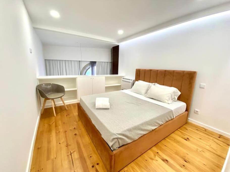 Postel nebo postele na pokoji v ubytování OHH-Padre Antonio Vieira Flat- HU