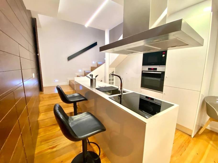 Kuchyň nebo kuchyňský kout v ubytování OHH-Padre Antonio Vieira Flat- HU