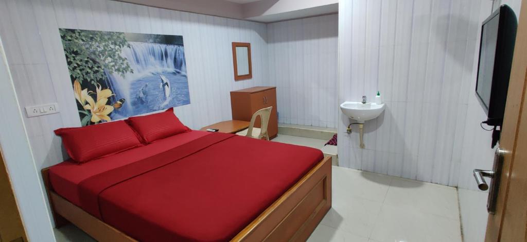 Postel nebo postele na pokoji v ubytování S.S.K RESIDENCY
