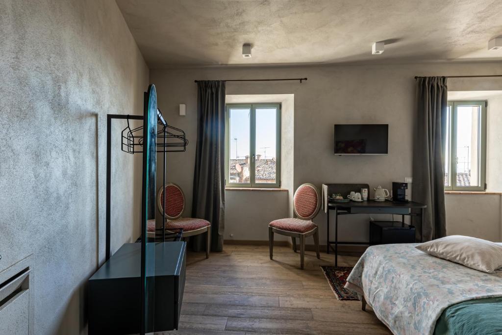 Postel nebo postele na pokoji v ubytování Casa Mustiola