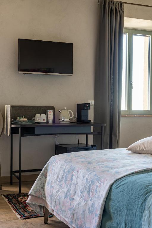 Postel nebo postele na pokoji v ubytování Casa Mustiola