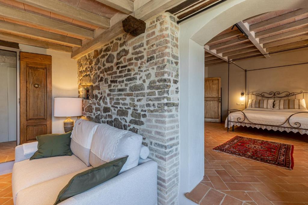 Postel nebo postele na pokoji v ubytování Casa Mustiola