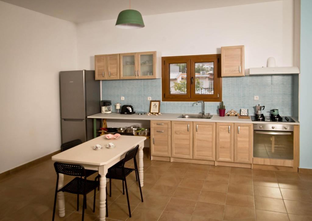 Kuchyň nebo kuchyňský kout v ubytování Persephone's Villa