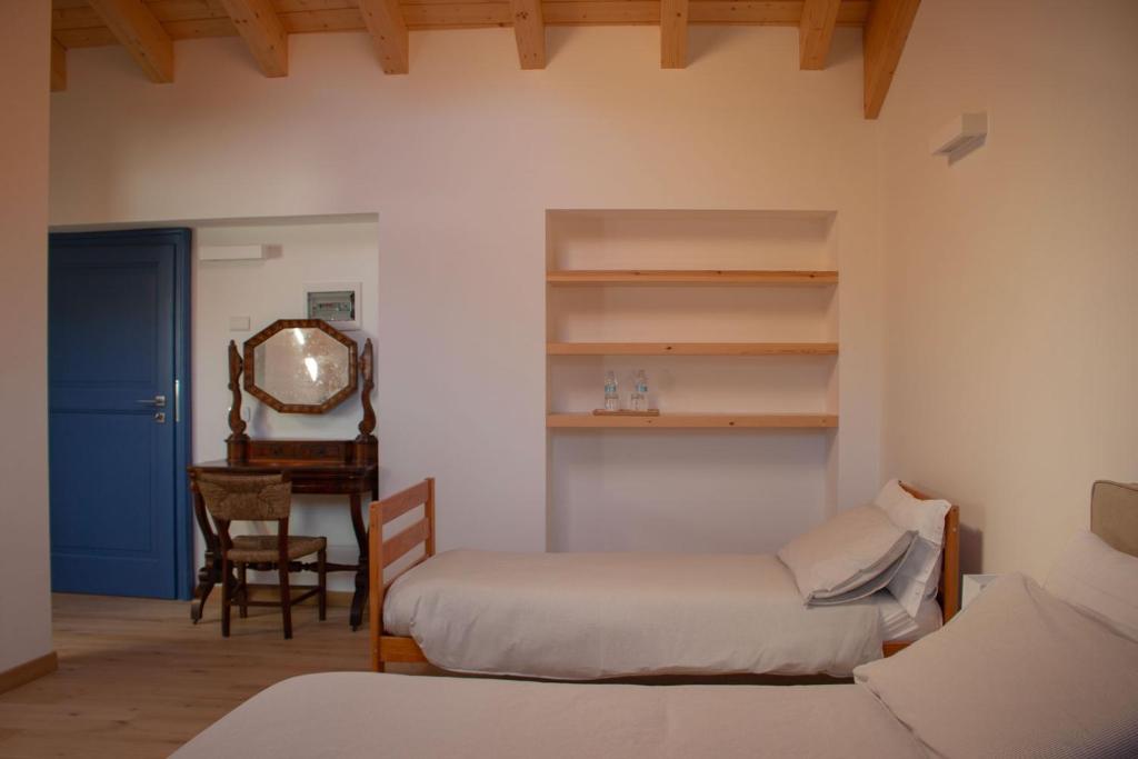 Postel nebo postele na pokoji v ubytování B&B Villa Cavallier