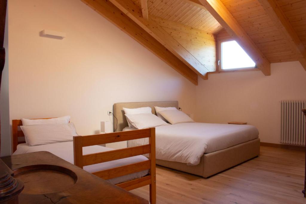Postel nebo postele na pokoji v ubytování B&B Villa Cavallier