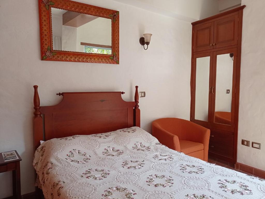 Postel nebo postele na pokoji v ubytování Posada Antiguo Camino Real