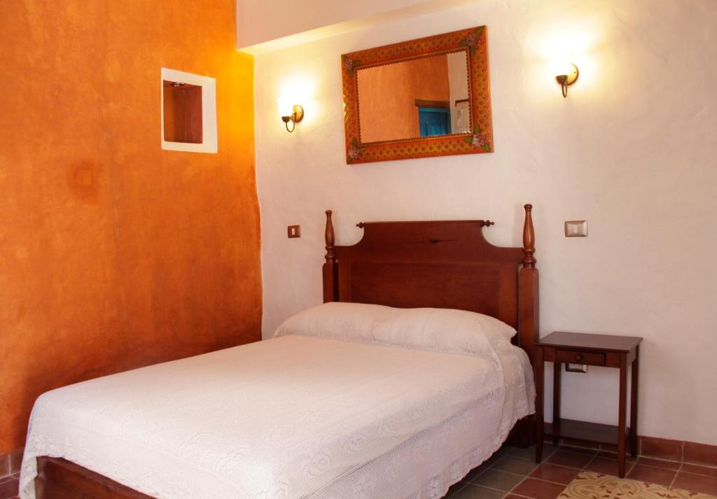 Postel nebo postele na pokoji v ubytování Posada Antiguo Camino Real