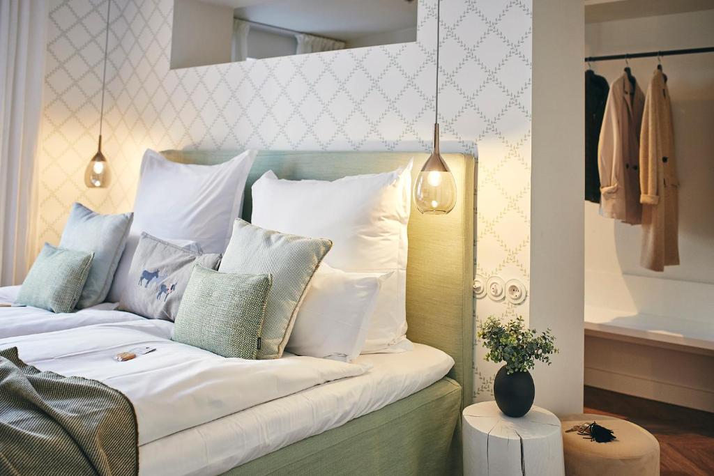 Postel nebo postele na pokoji v ubytování BUITERLING Hotel