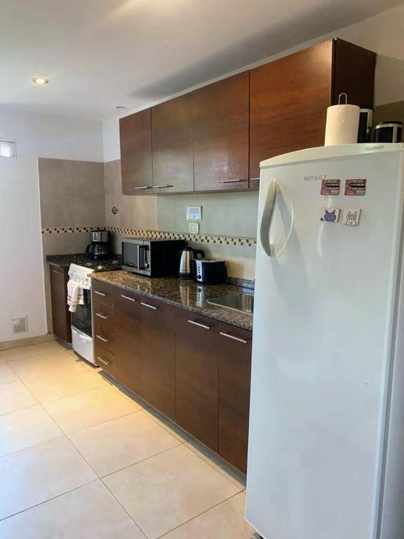 Kuchyň nebo kuchyňský kout v ubytování Departamento duplex