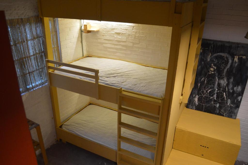 Postel nebo postele na pokoji v ubytování Canova Hostel & Pizza